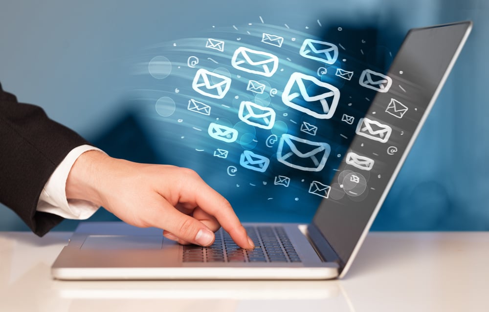 illustration of computer with email graphics